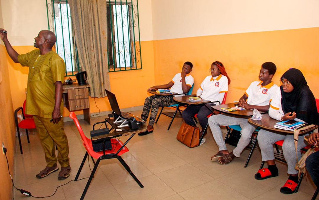 Students taking notes during a class at ELA